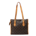 Louis Vuitton Popincourt Haut shoulder bag in brown Monogram canvas with tan leather trim and two long adjustable straps with gold-tone buckles.