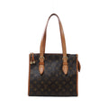 Louis Vuitton Monogram canvas shoulder bag with long tan leather straps, buckle details, gold-tone hardware and decorative zipper pulls.