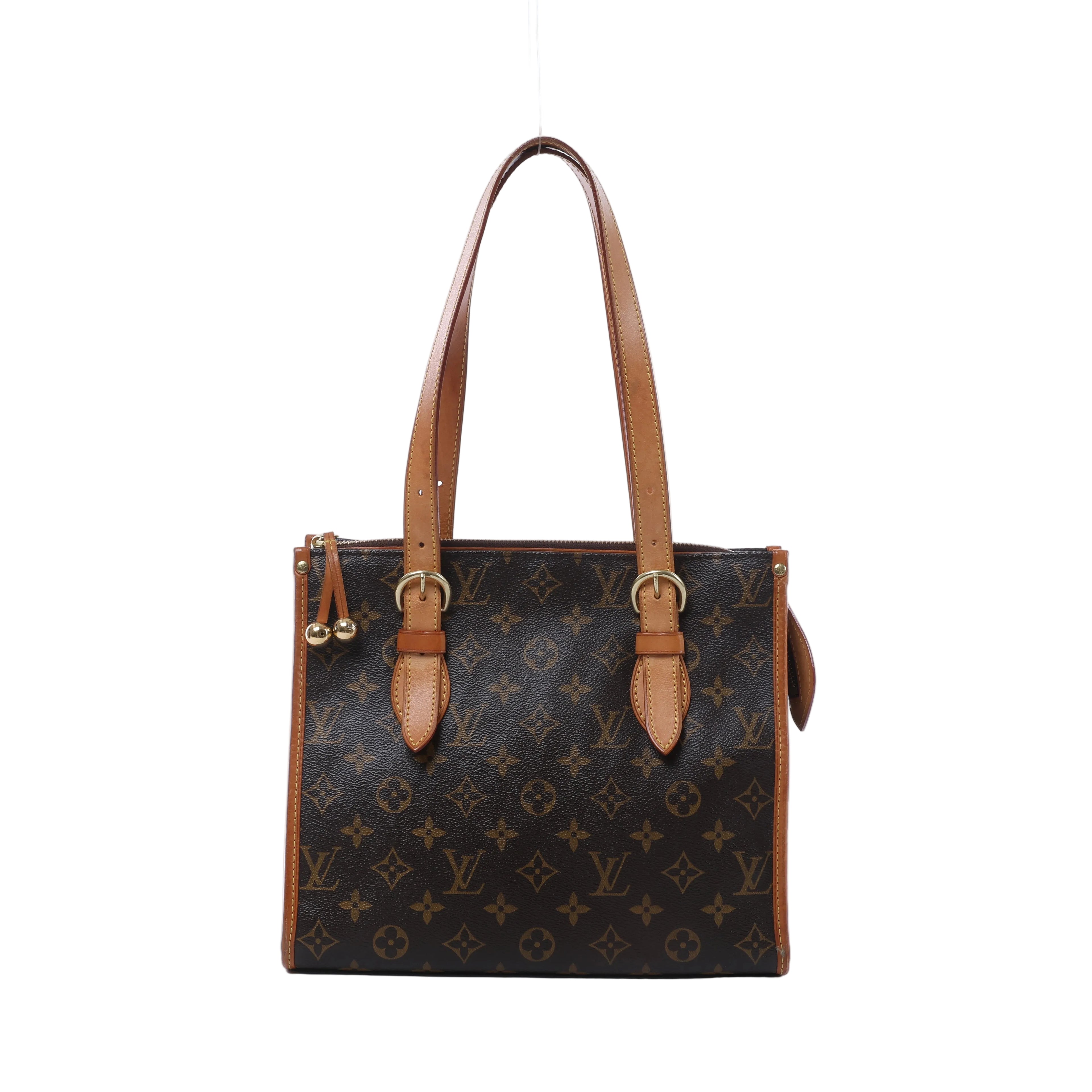 Louis Vuitton Monogram canvas shoulder bag with long tan leather straps, buckle details, gold-tone hardware and decorative zipper pulls.