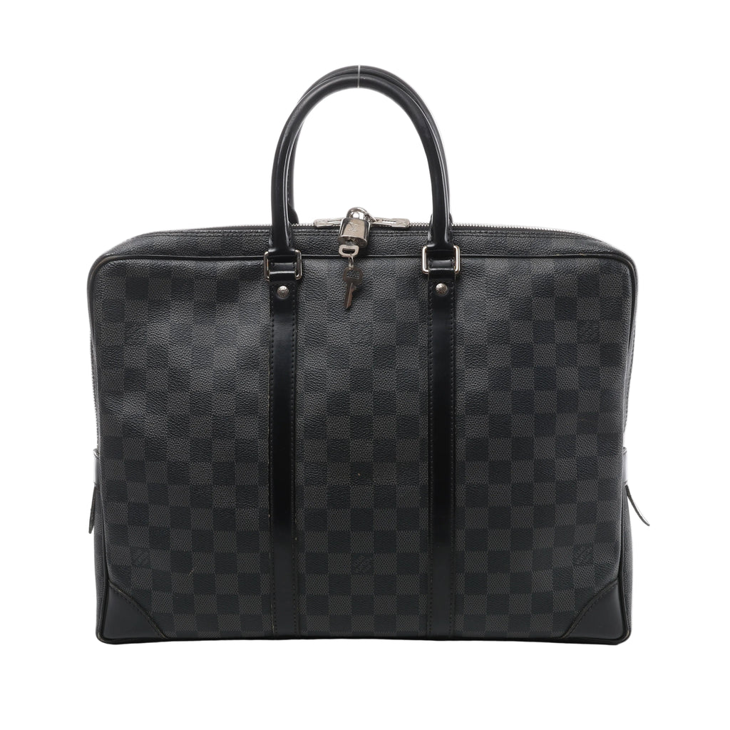 Black Louis Vuitton Porte Document Voyages bag in Damier Graphite checkered canvas with leather trim, double top handles, zip closure, lock and silver-tone hardware.