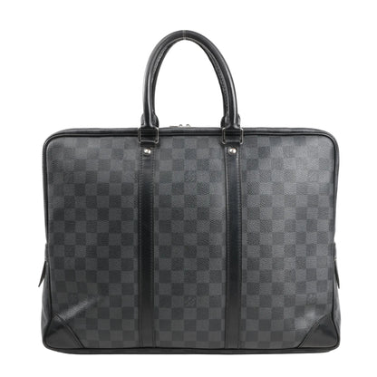 Louis Vuitton Porte-Documents Voyage handbag in dark gray Damier Graphite canvas, featuring black leather top handles, trim, and structured rectangular shape with silver-tone hardware.
