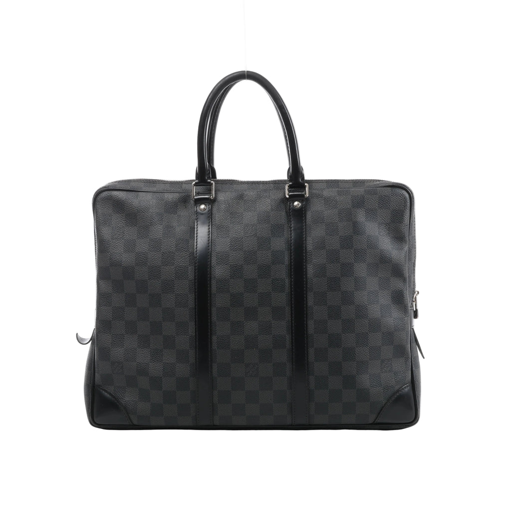 Front view of Louis Vuitton Porte-Documents Voyage with black and grey Damier Graphite checks, rounded black handles, leather trim and reinforced corners.