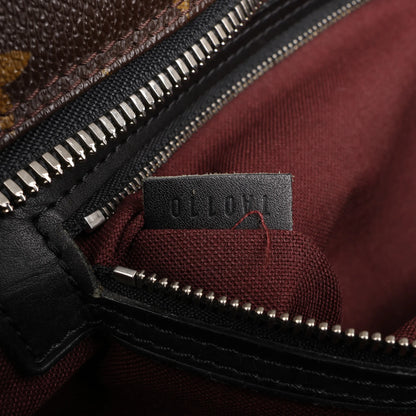 Louis Vuitton Monogram Macassar Porte Document Voyages Handbag in Brown M40224