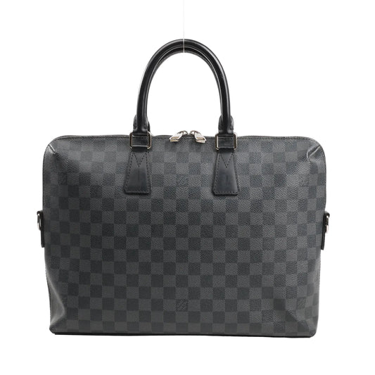 Louis Vuitton Porte-Documents Jour handbag in black Damier Graphite canvas featuring a checkered pattern, dual rolled leather handles, and silver-tone hardware.