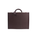 Front view of Louis Vuitton Président briefcase in purple Taiga leather with structured hard-case shape, top handle, and studded edge detailing.