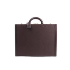 Front view of Louis Vuitton Président briefcase in purple Taiga leather with structured hard-case shape, top handle, and studded edge detailing.