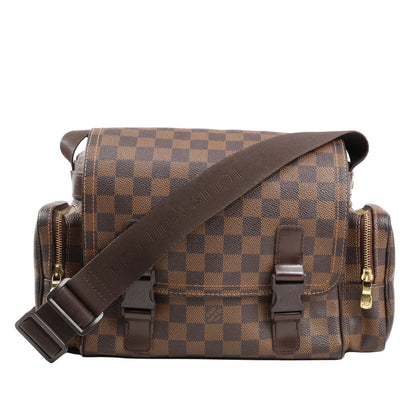 Louis Vuitton Reporter Melville Crossbody Bag N51126 in brown Damier Ebene canvas with dark leather trim, front buckle closures, side zip pockets, and adjustable Louis Vuitton logo strap on a white background.