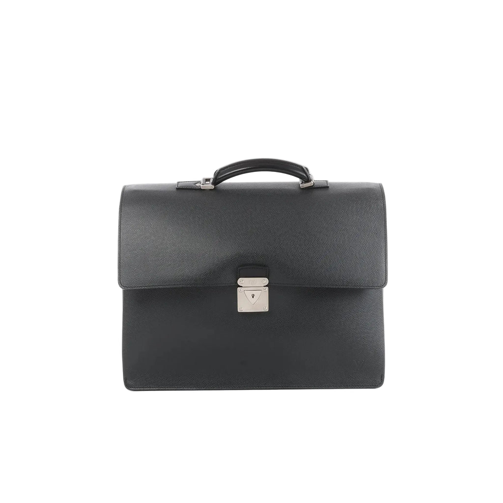 Front view of black Louis Vuitton Taiga leather Robusto briefcase with top handle and silver-tone lock closure on a white background.