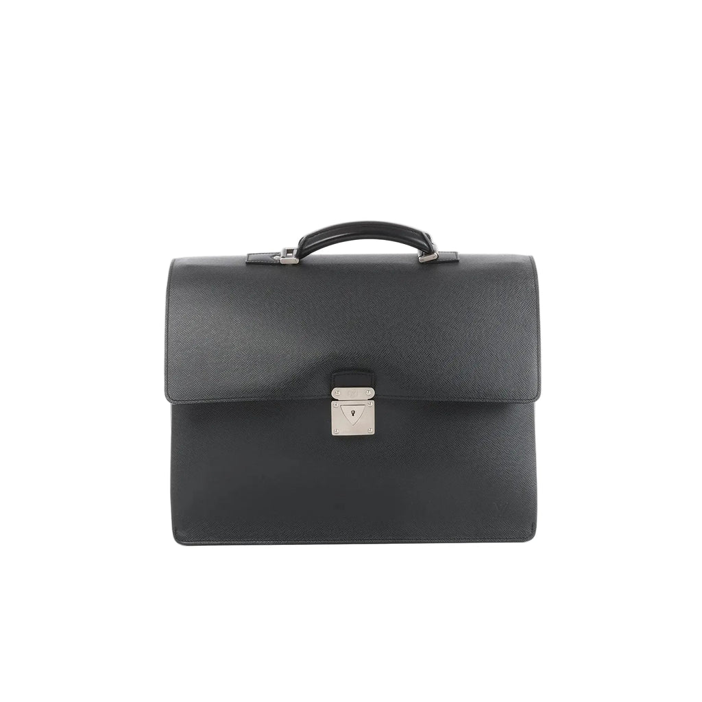 Front view of black Louis Vuitton Taiga leather Robusto briefcase with top handle and silver-tone lock closure on a white background.