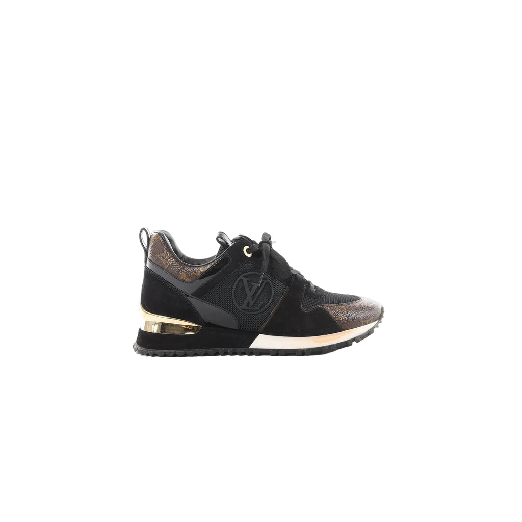 Louis Vuitton Run Away black mesh and suede sneaker with LV logo detail, brown Monogram accents, and gold-tone heel insert, side view on white background.