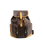 Louis Vuitton Sac à Dos Bosphore Monogram canvas backpack with tan leather trim, buckled flap, two front zip pockets and gold-tone hardware.