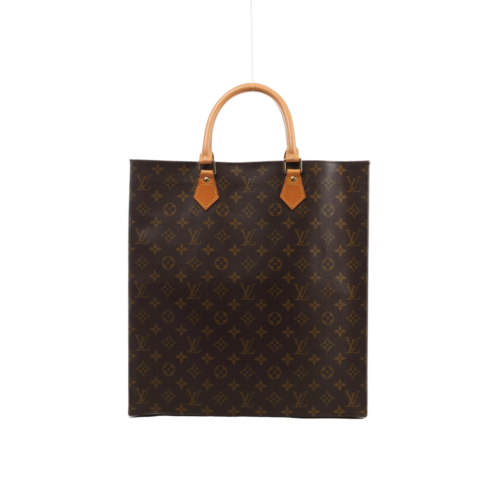 Brown Louis Vuitton Sac Plat Monogram canvas handbag with tan leather top handles, gold-tone rivets and a rectangular silhouette.