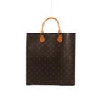 Brown Louis Vuitton Sac Plat Monogram canvas handbag with tan leather top handles, gold-tone rivets and a rectangular silhouette.