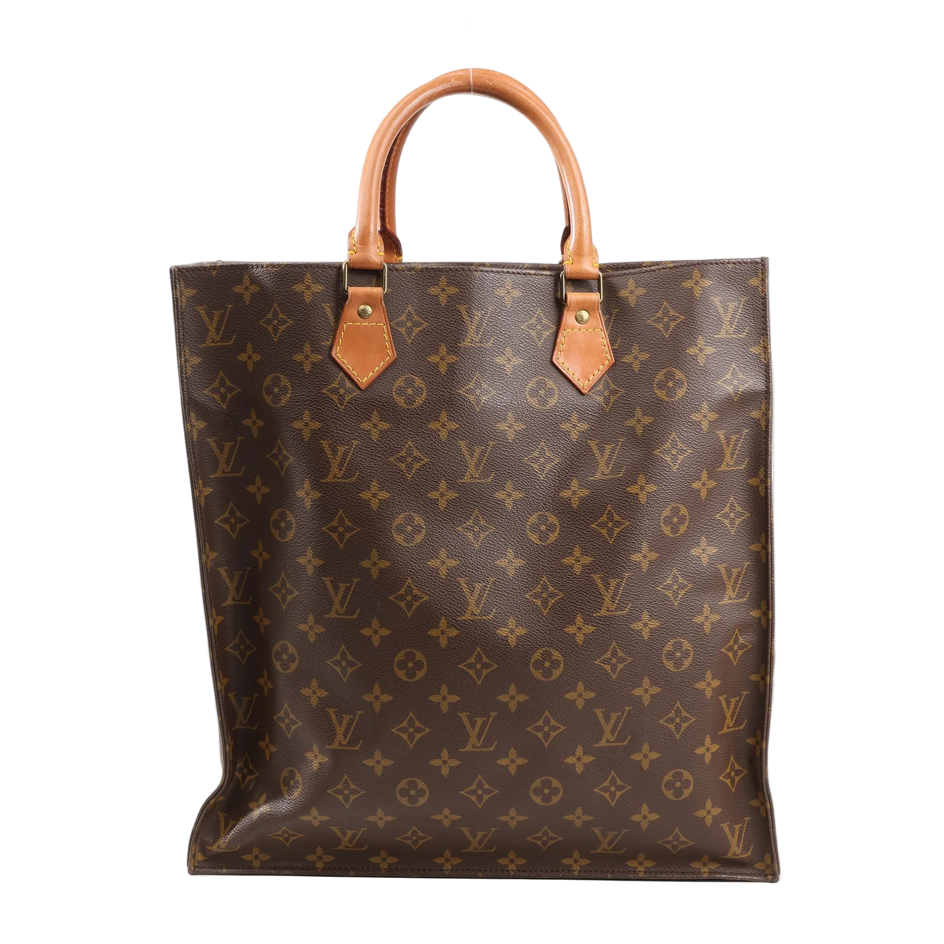 Louis Vuitton Sac Plat GM handbag in monogram canvas with leather top handles and a structured flat design.
