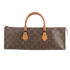 Louis Vuitton Sac Triangle brown monogram canvas handbag with zip-top closure and two natural leather top handles on white background