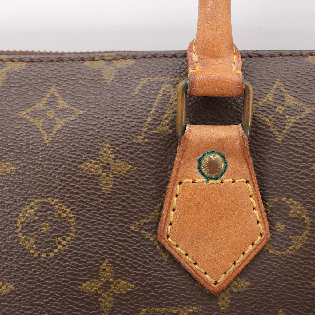 Louis Vuitton Sac Triangle Monogram Canvas Handbag in Brown M51360