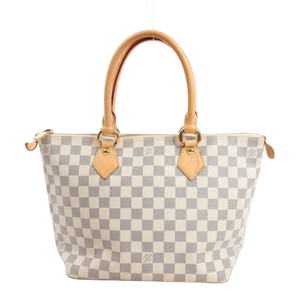 Louis Vuitton Saleya PM handbag in Damier Azur canvas with beige checkered pattern, natural cowhide leather handles and trim, gold-tone hardware, and zip-top closure, displayed against a white background.