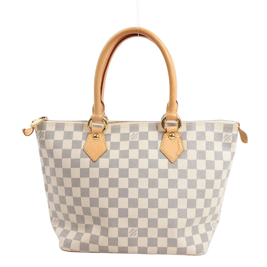 Louis Vuitton Saleya PM handbag in Damier Azur canvas with beige checkered pattern, natural cowhide leather handles and trim, gold-tone hardware, and zip-top closure, displayed against a white background.