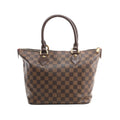 Louis Vuitton Saleya PM brown Damier Ebene checkered tote handbag with two dark leather rolled top handles, gold-tone hardware, and a top zip closure, shown on a white background.