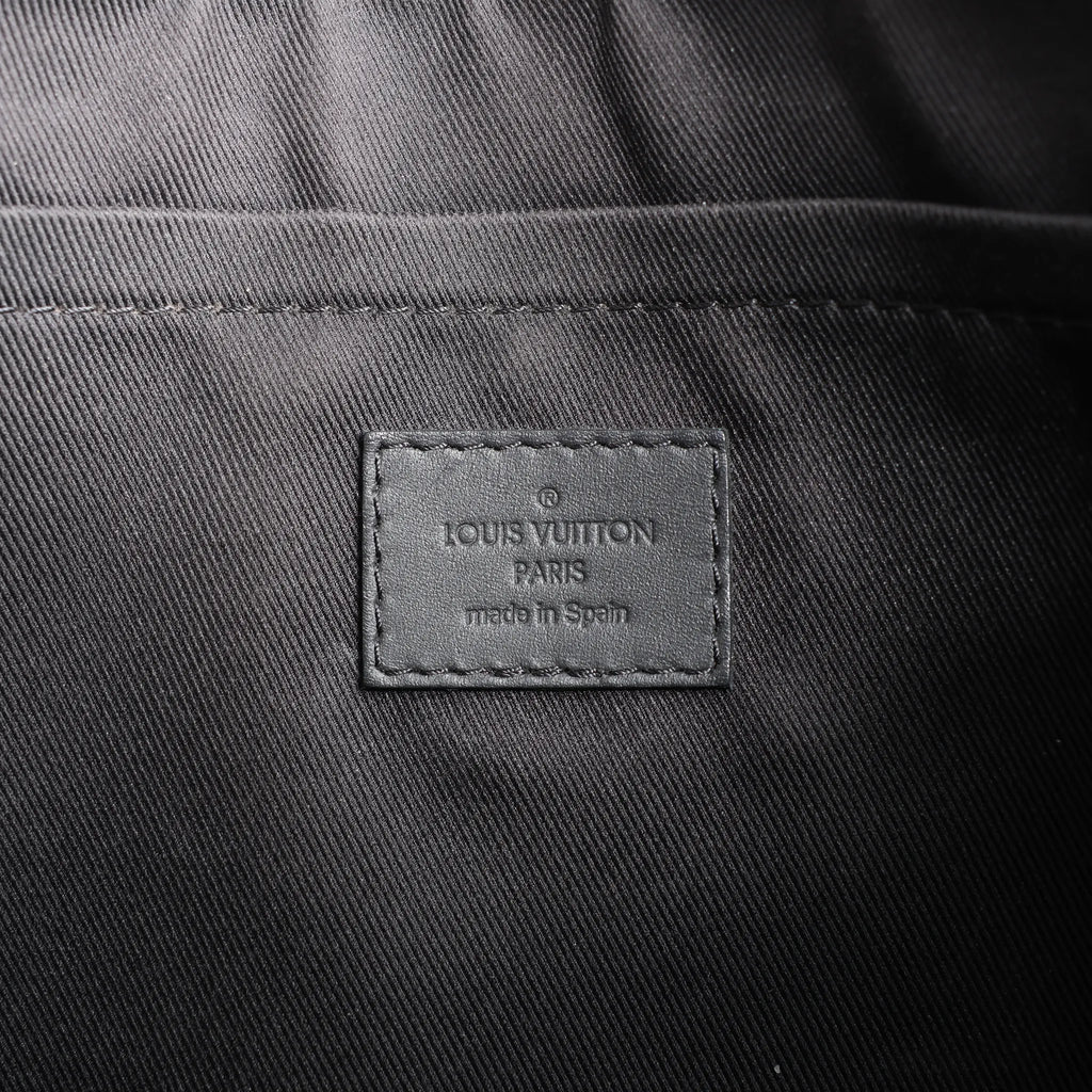 Louis Vuitton Pochette Discovery Monogram Shadow Clutch in Black M62903
