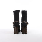 Botines Louis Vuitton Silhouette Lines de charol en negro BR0137, talla 37.5 EU