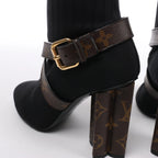 Botines Louis Vuitton Silhouette Lines de charol en negro BR0137, talla 37.5 EU