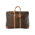 Louis Vuitton Sirius 55 monogram canvas travel bag in brown with tan vachetta leather straps, top handle, zip closure, and hanging luggage tag.