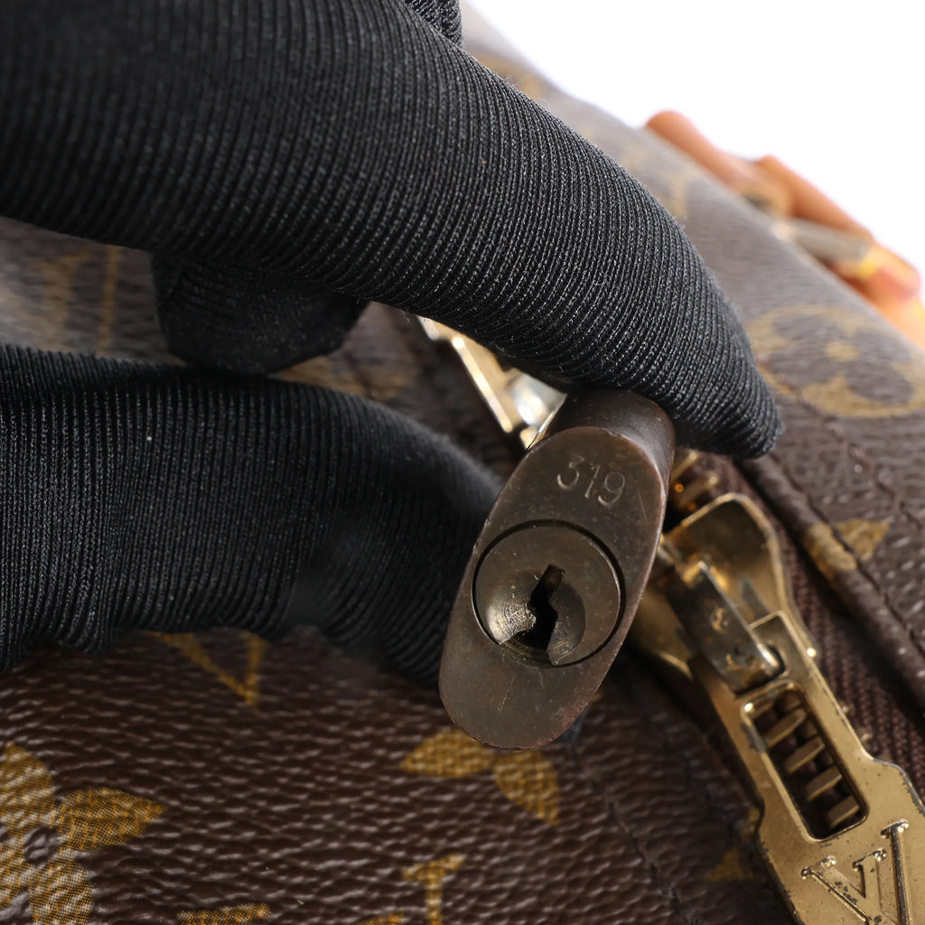 Louis Vuitton Sirius 60 Monogram Canvas Travel Bag in Brown M41402