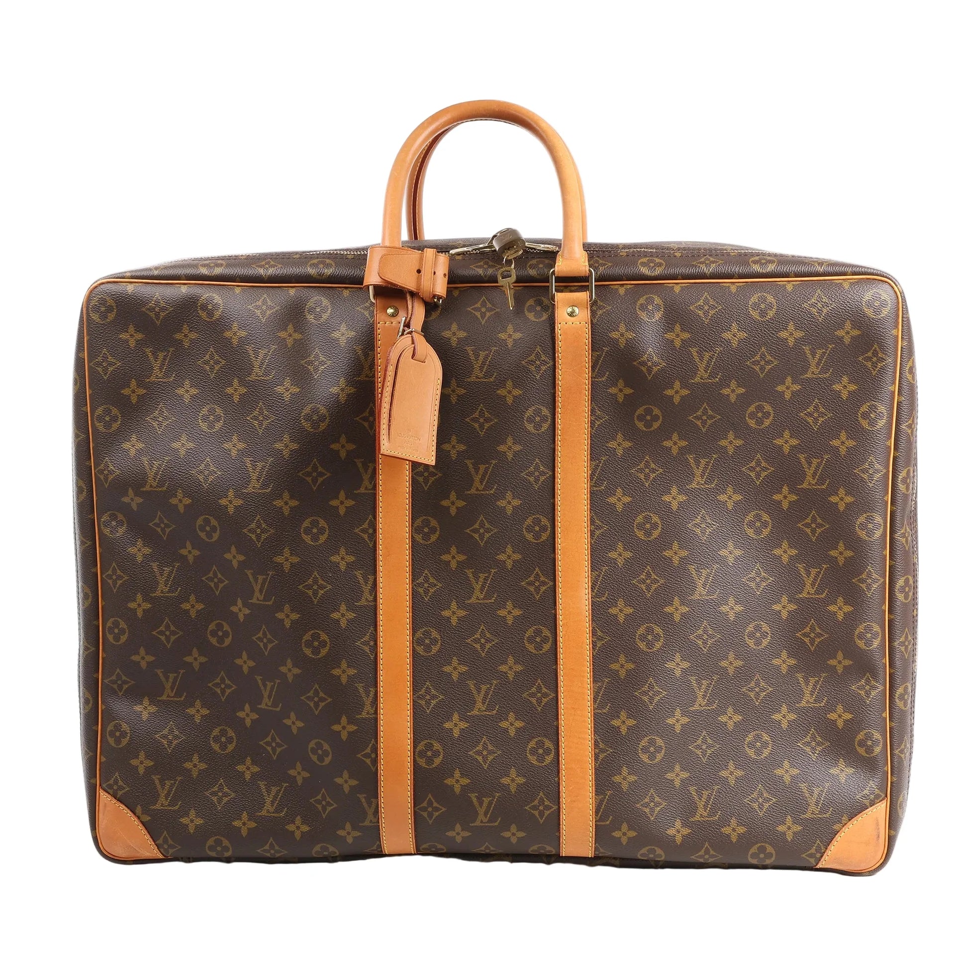 Louis Vuitton Sirius 60 travel bag M41402 in brown monogram canvas with tan leather trim, top handles, luggage tag, and structured rectangular shape against a white background.