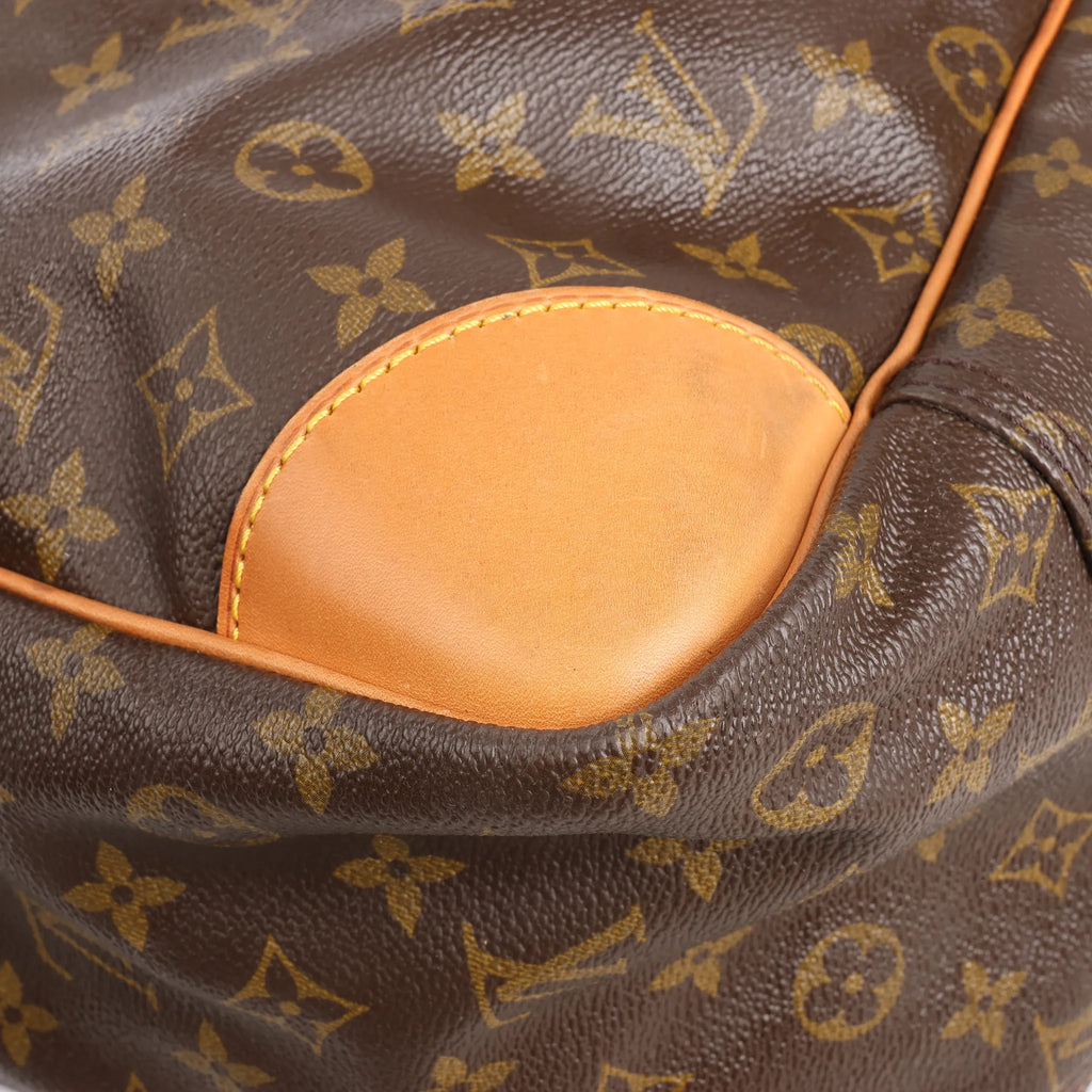 Louis Vuitton Sirius 65 Monogram Canvas Travel Bag in Brown