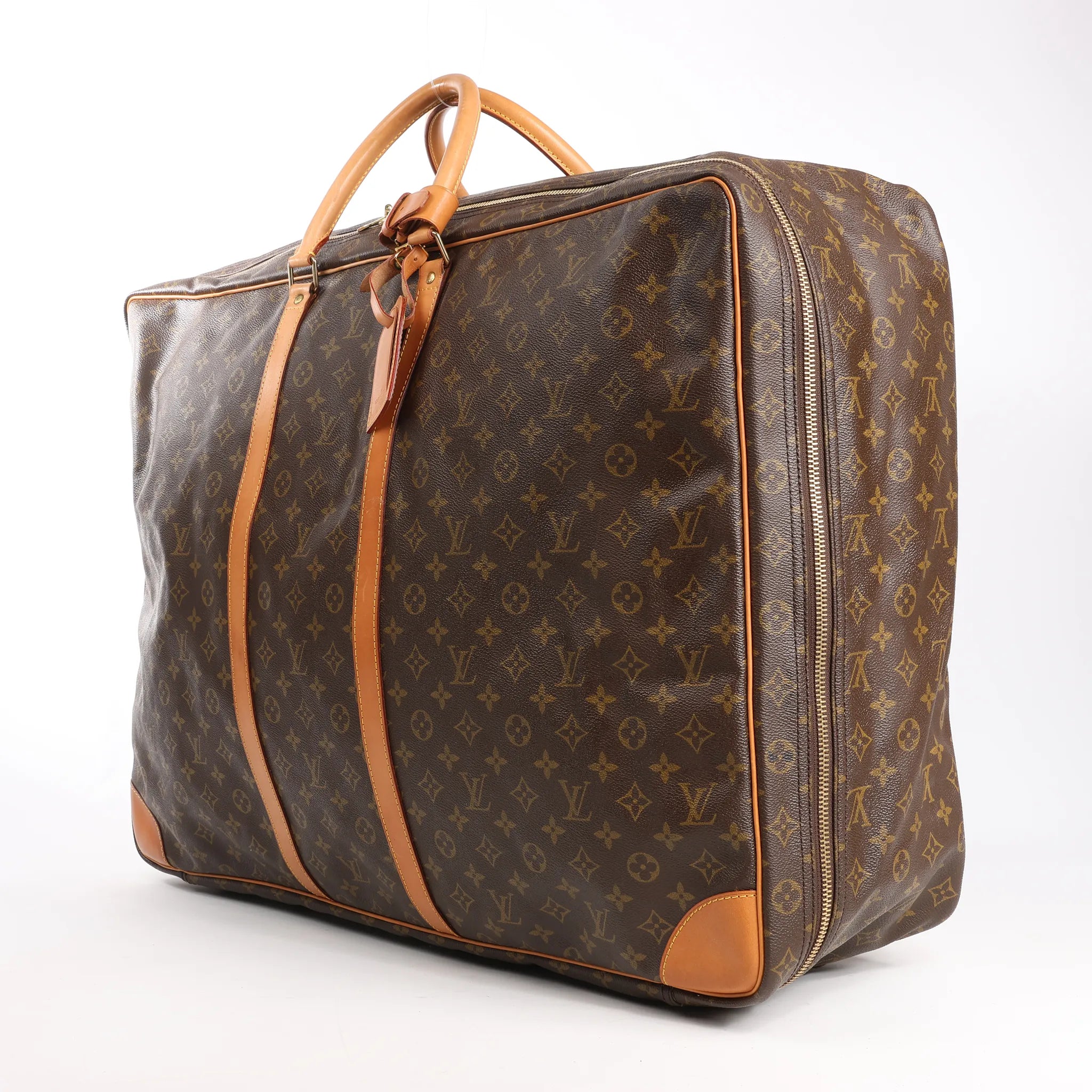 Louis Vuitton Sirius 65 Monogram Canvas Travel Bag in Brown
