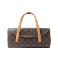 Front view of a brown Louis Vuitton Sonatine Monogram canvas handbag with a curved flap and two tan leather top handles on a white background.