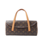 Front view of a brown Louis Vuitton Sonatine Monogram canvas handbag with a curved flap and two tan leather top handles on a white background.