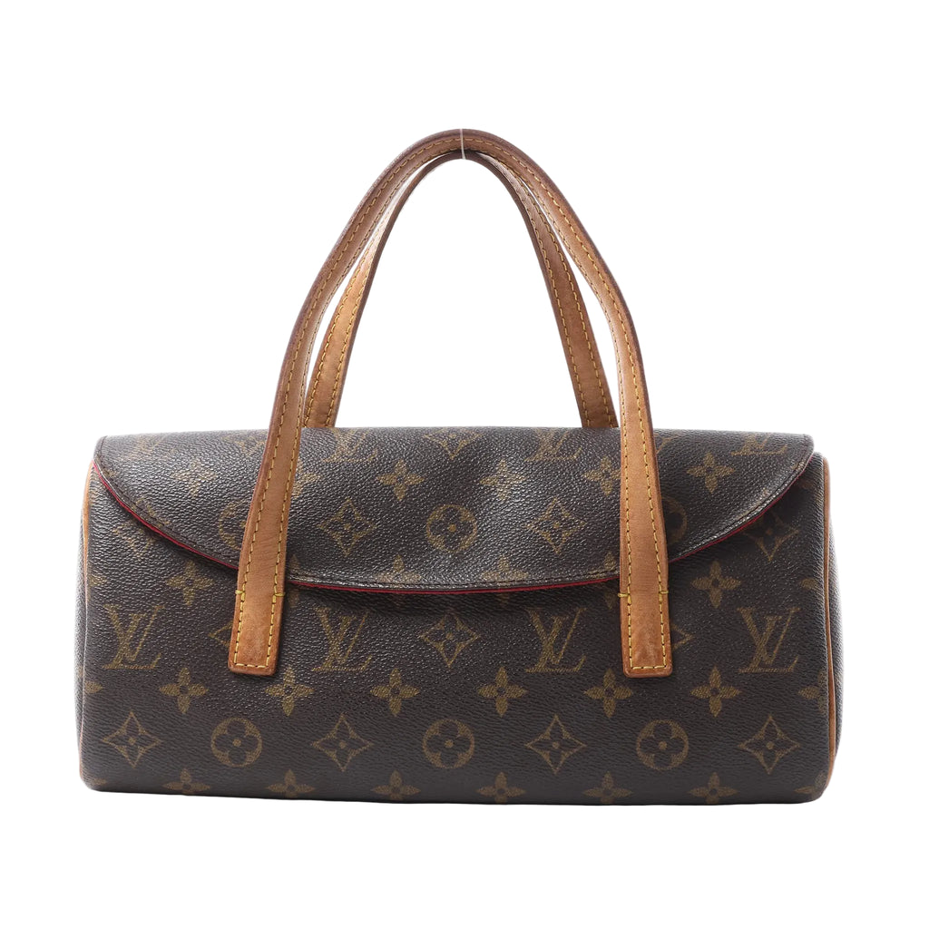 Louis Vuitton Sonatine handbag in brown Monogram canvas with tan leather top handles, curved flap front and red edge detailing.
