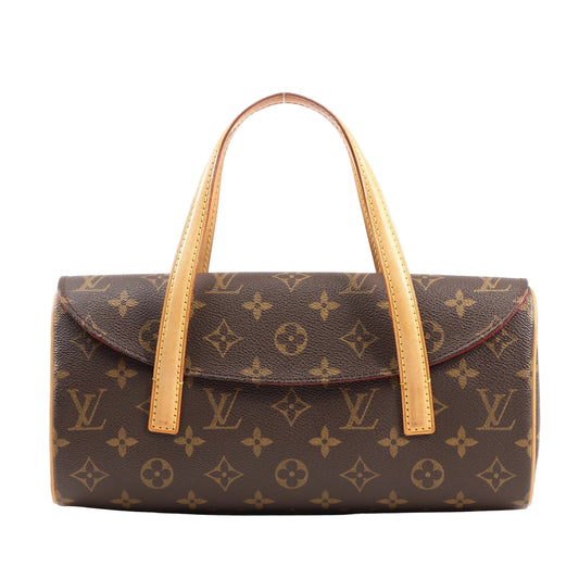Louis Vuitton Monogram Canvas Sonatine Shoulder Bag M51902 featuring a structured rectangular shape, brown monogram canvas body, curved flap closure, and dual natural vachetta leather top handles, displayed upright against a white background.