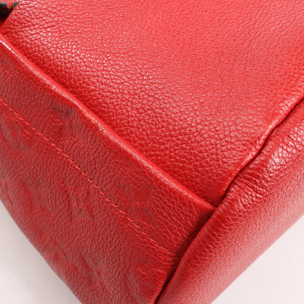 Louis Vuitton Sorbonne Monogram Empreinte Backpack in Red M44015