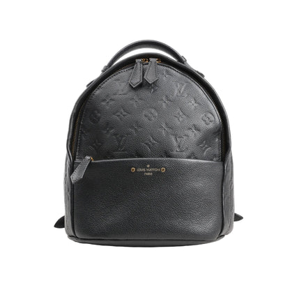 Louis Vuitton Monogram Empreinte Sorbonne Backpack M44016 in black grained leather with embossed monogram pattern, featuring a rounded top, front zip pocket, gold-tone hardware, and top handle, photographed against a white background.