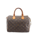 Louis Vuitton Speedy 25 handbag in brown Monogram canvas with tan vachetta leather top handles and zip-top closure, front view on white background.