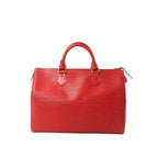 Red Louis Vuitton Speedy 30 handbag in textured Epi leather with top handles, gold-tone hardware, and zip closure on a white background.