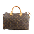 Front view of a Louis Vuitton Speedy 30 M41526 handbag in brown Monogram canvas, featuring natural leather handles, gold-tone hardware, and attached padlock with key.