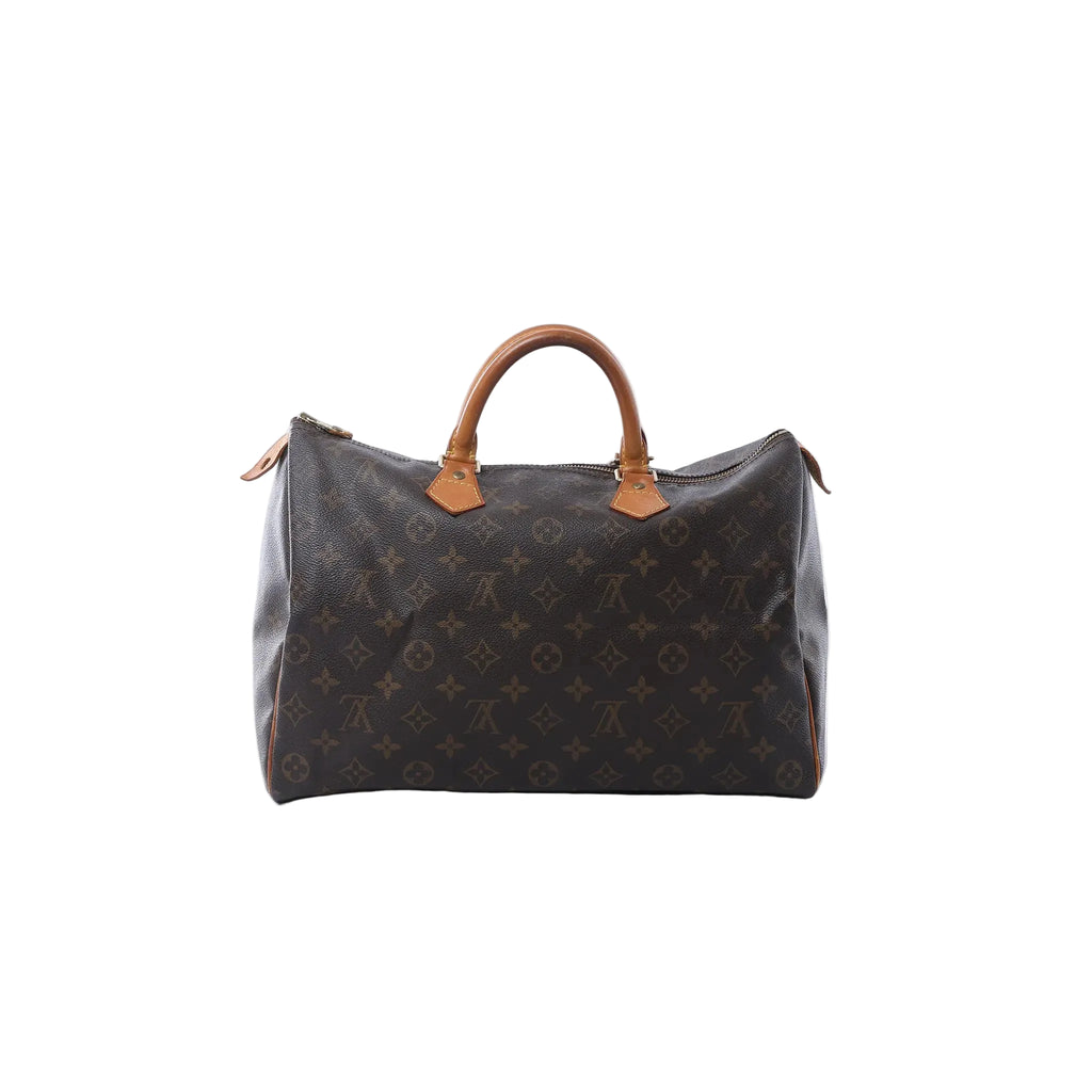 Louis Vuitton Speedy 30 handbag in brown Monogram canvas with tan vachetta leather handles, zip-top closure, and leather zipper pulls on white background.