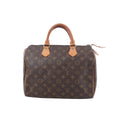 Louis Vuitton Speedy 30 handbag in brown Monogram canvas with tan vachetta leather handles, zip-top closure, and leather zipper pulls on white background.