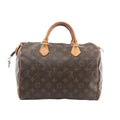 Louis Vuitton Speedy 30 brown Monogram canvas handbag with vachetta leather rolled top handles, vachetta trim, and top zip closure, shown on a white background.
