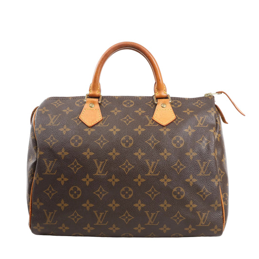 Louis Vuitton Speedy 30 handbag in brown monogram canvas with natural leather top handles, gold-tone hardware, and a zip closure.