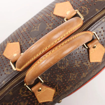 Louis Vuitton Speedy 30 Monogram Perforated Handbag in Brown x Red M95182