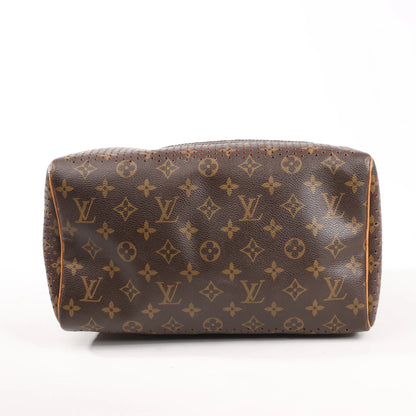 Louis Vuitton Speedy 30 Monogram Perforated Handbag in Brown x Red M95182