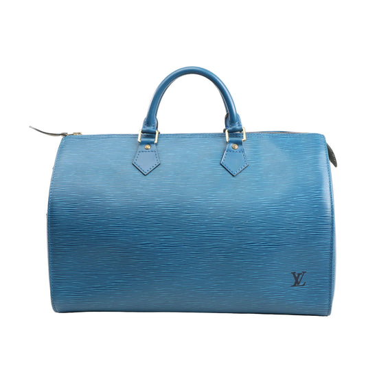 Louis Vuitton Epi Leather Speedy 35 Handbag M42995 in vibrant blue with signature textured leather, structured silhouette, dual rolled handles, and subtle LV logo embossing on the bottom corner, shown against a white background.