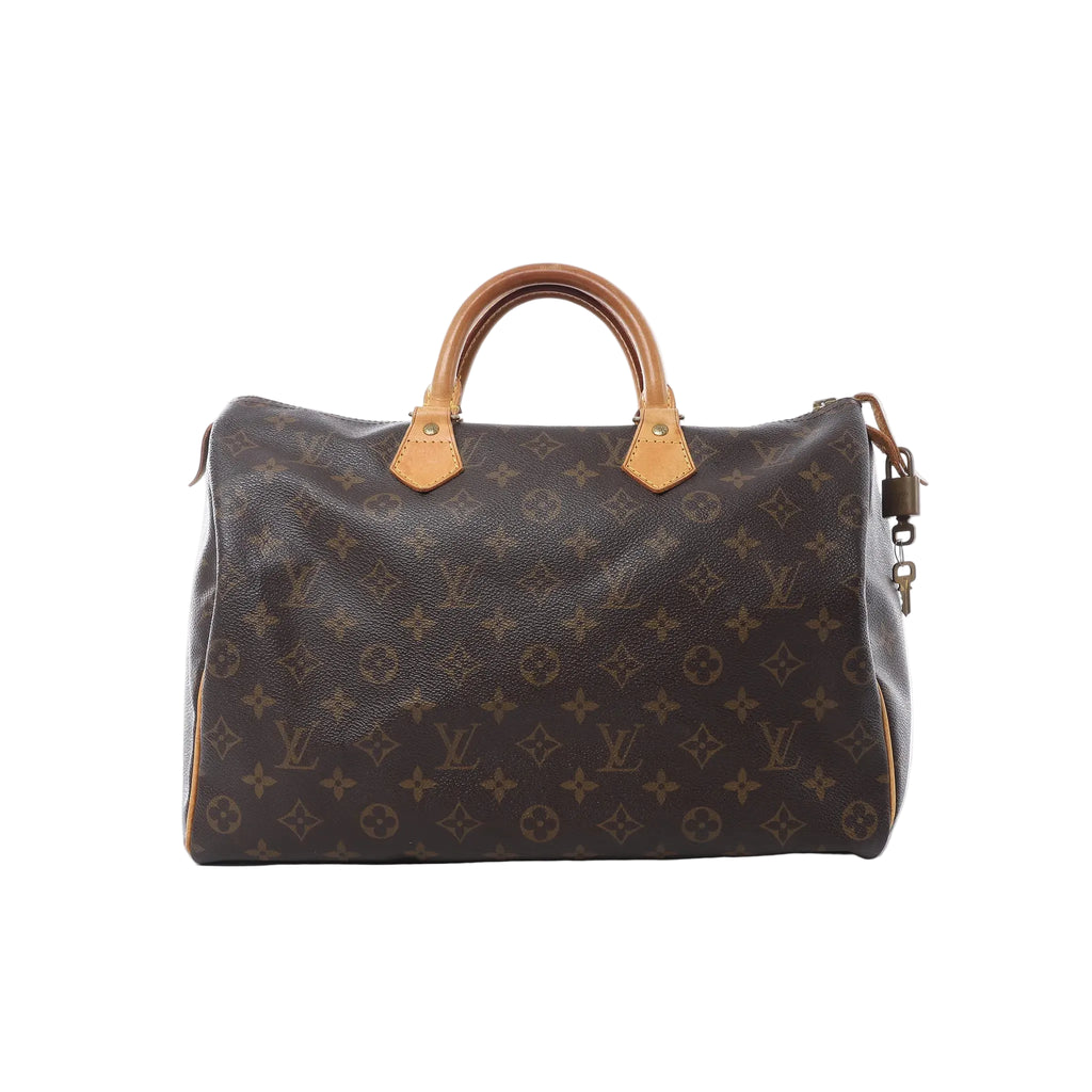 Louis Vuitton Speedy 35 handbag in brown Monogram canvas with tan vachetta leather handles, zip-top closure, leather zipper pulls, and hanging padlock on white background.