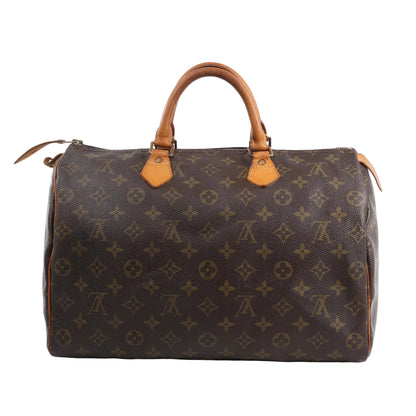 Louis Vuitton Monogram Speedy 35 Handbag M41524 in brown coated canvas with allover monogram print, natural Vachetta leather top handles and trim, and gold-tone zipper, displayed upright against a white background.
