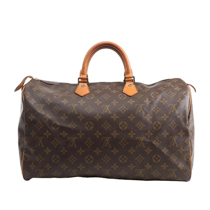 Louis Vuitton Monogram Speedy 40 Handbag M41522 featuring brown LV monogram canvas, tan leather handles and trim, gold-tone hardware, and zip closure, displayed on a white background.